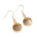 Macro view of gold-plated fish hook earrings with a 1g round blank bezel tray base - Medium Size / KC Gold
