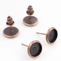 Macro detail of red copper blank earring studs and backings for DIY jewelry making - 6mm (50 Pieces/Pack, Without Backs) / Copper