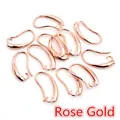 Dettaglio di ganci per orecchini in rame oro rosa lucido per creazioni fai-da-te - Oro rosa