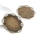 30x40mm vintage bronze oval alloy pendant base with hollow floral edges for DIY jewelry - Vintage Hollow Pattern Antique Bronze (B3-60)