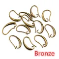 Detailed view of DIY bronze French earring hooks for jewelry making on white background - 19x10mm / Bronze