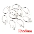 Detail view of 10 rhodium-plated copper ear hooks with spiral coils and jump rings - White K/Silver