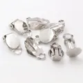 Macro detail of silver plated 10mm flat pad ear clips for DIY earring jewelry making - White K/Silver