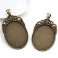 Base per ciondolo ovale bronzo antico 30x40mm con decoro floreale vintage - Motivo Perle Cavo Bronzo Antico (B2-10)