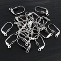 Close-up of 17x11mm silver leverback earring hooks for DIY jewelry making accessories - Silver