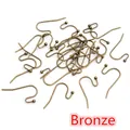 Detailed view of bronze S-shaped earring hooks with ball ends for DIY jewelry making - 100 Pcs/Pack (21x16mm) / Antique Bronze