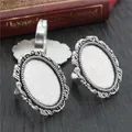 Pair of vintage oval alloy ring settings with vine relief in an antique silver finish - Antique Silver Vine Relief (J4-23)