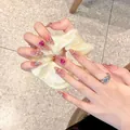 Pink cat eye press-on nails with rose heart gems and glitter for a minimalist summer look - Extra Small (XS) / 2107-Almond