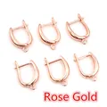 Detailed view of six rose gold U-shaped earring hooks for DIY jewelry making - Rose Gold