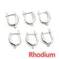 Close-up of 6 rhodium-plated copper U-shape earring hooks for DIY jewelry making - White K/Silver