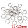 Ciondolo a fiore in acciaio inossidabile 12x12mm per creazione gioielli fai-da-te - Forma di Fiore - Argento (12x12mm) / Confezione da 20