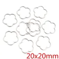 Dettaglio di ciondoli a fiore d'argento per gioielli fai da te misura 20x20mm - Forma di Fiore - Argento (20x20mm) / Confezione da 20