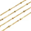 Detailed view of polished golden stainless steel satellite chain for DIY jewelry making - 2.5x2mm / Gold