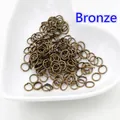 200 anellini aperti in bronzo per gioielli in un piatto di ceramica bianca a forma di cuore - 0.5x3mm (200 Pezzi/Confezione) / Bronzo Antico