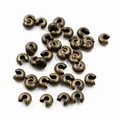 Set di copri-schiaccini in bronzo antico per creazione gioielli su sfondo bianco - Bronzo Antico