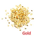 Macro shot of 500 pieces bulk golden jewelry crimp beads for DIY bracelet making - Gold