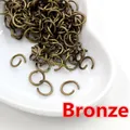 Offene Binderinge aus Bronze für DIY-Schmuckherstellung in weißer Herzschale - Antikbronze