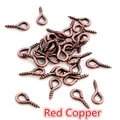 Detailed view of red copper screw eye pins for DIY jewelry making and pendants - Copper