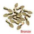 Leaf-shaped bronze alloy pendants with hammered texture for DIY jewelry making - 15x5mm (40 Pieces/Pack) / Antique Bronze