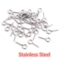 Macro shot of silver stainless steel eye pins for DIY jewelry making and pendants - Stainless Steel