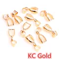 Close-up of KC gold copper pendant pinch bails and jewelry connectors for DIY making - KC Gold