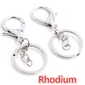 Set of two rhodium-plated lobster clasp keychains with polished metal rings and chains - White K/Silver