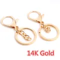Set of two shiny 14K gold lobster clasp keychains with chain and split ring components - 14K Gold