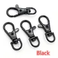 Set di quattro moschettoni girevoli in lega di zinco nero lucido con anello a D - Nero