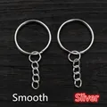 DIY silberner Schlüsselring mit viergliedriger Kette und glatter Oberfläche auf Holz - Glatt / 20 Stück/Packung / Silber