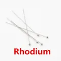 Macro detail of five rhodium plated round head pins for jewelry making and DIY crafts - 16mm / White K/Silver