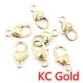 Karabinerverschlüsse in Herzform in KC Gold für die DIY Schmuckherstellung - Gestreift / KC Gold