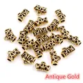 Antique gold cylinder hollow spacers with carved texture for DIY jewelry making - Antique Gold