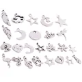 Assorted silver stainless steel DIY jewelry pendants in star, moon, and feather shapes - Random Mixed Styles
