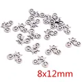 Macro shot of 8x12mm hollow bicycle shaped stainless steel pendants for DIY jewelry - Bicycle Shape / 8X12mm
