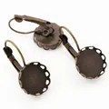 Dormeuses en bronze antique avec serti dentelle pour la création de bijoux DIY - 12mm / Bronze