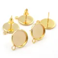 Macro shot of gold-plated earring studs with round bezels and small hanging loops - No Ear Plugs Style / 8mm / Gold