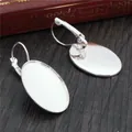 Boucles d'oreilles ovales argentées avec base de plateau pour bijoux DIY sur bois sombre - 10x14mm / Argent