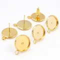 Macro view of gold-plated earring posts with bezel settings and hanging loops for DIY jewelry - No Ear Plugs Style / 8mm / Dotted Gold
