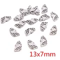 Silver stainless steel hollow wolf head charm pendant accessory, size 13x7mm - Wolf Head Style (Q2-45)