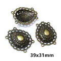 Macro view of 39x31mm antique bronze teardrop connectors for DIY jewelry making - Teardrop Hollow Style (AI1-04)