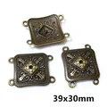 Detailed 39x30mm antique bronze connectors with intricate hollow relief for DIY jewelry - Rounded Rectangle Hollow Style (AI1-05)