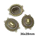 Detail of vintage bronze oval multi-hole jewelry connectors measuring 36x28mm - Oval Grid Style (AI1-06)