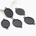 Five black oval alloy pendant trays with dual loops for DIY jewelry making - Black Oval Dual Hole Connector