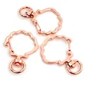 Three rose gold shell-shaped swivel lobster clasps for keychains and bag accessories - Shell / Rose Gold