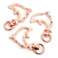 Three-piece rose gold dolphin-shaped keychain swivel hooks with a polished metal finish - Dolphin / Rose Gold