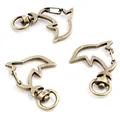 Three bronze dolphin-shaped lobster clasps with swivel rings for keychain making - Dolphin / Antique Bronze