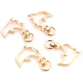 Set of four dolphin-shaped golden lobster clasps with rotating rings for DIY keychains - Dolphin / KC Gold