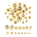 Detailed comparison of various sizes of gold plated stainless steel spacer beads with holes - 2x1mm (100 Pieces/Pack) / Gold