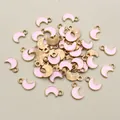 Macro view showing bulk pink moon alloy charms with golden plating for DIY jewelry - Pink (E1-30)