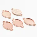 Macro view of oval rose gold alloy pendant trays with textured back and dual rings - Rose Gold Double Ring Connector Base Style (D4-18)